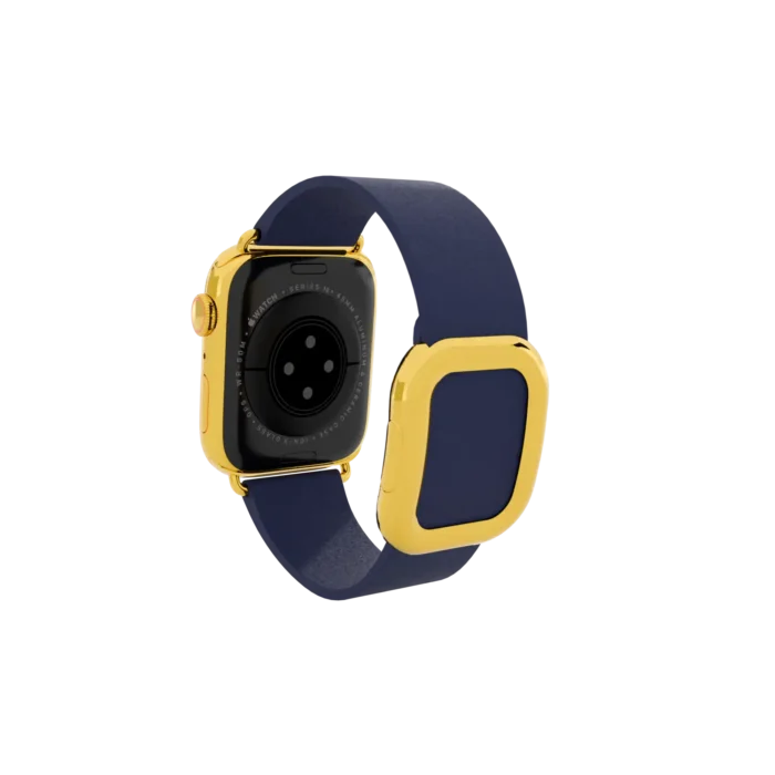 Back view of Apple Watch with gold casing and blue strap showing sensor detailing