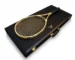 Luxury gold tennis racket presented in premium case showcasing elite sports customization