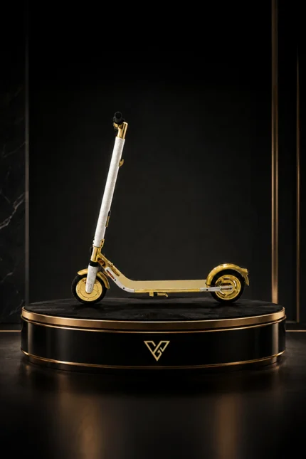 24K Gold Segway Glide Royale on a round black plinth, gold deck and wheels below a crystal-set steering column