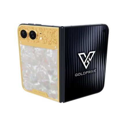 Royal Gold iPhone Duo opened flat with baroque gold engraving above a mother of pearl panel