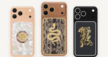Three custom iPhones designed with GoldPrivé: rose gold with mother of pearl, brown with snake leather and a gold serpent, black with carbon fibre and a gold tiger